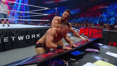 LA Knight Hits Miz Against a Table WWE Payback