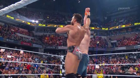 LA Knight lifts Cenas hand